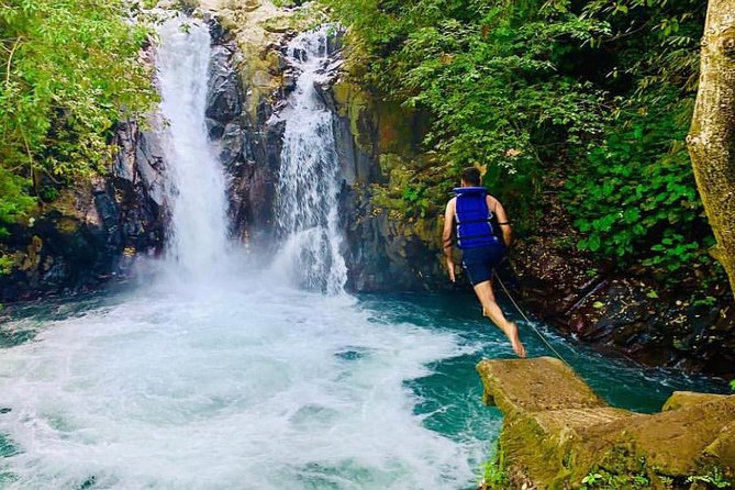 All Inclusive : Jumping Sliding at Aling- Aling Waterfall - Handara Gate - Lunch - Coffee plantation and Handara Gate add variety