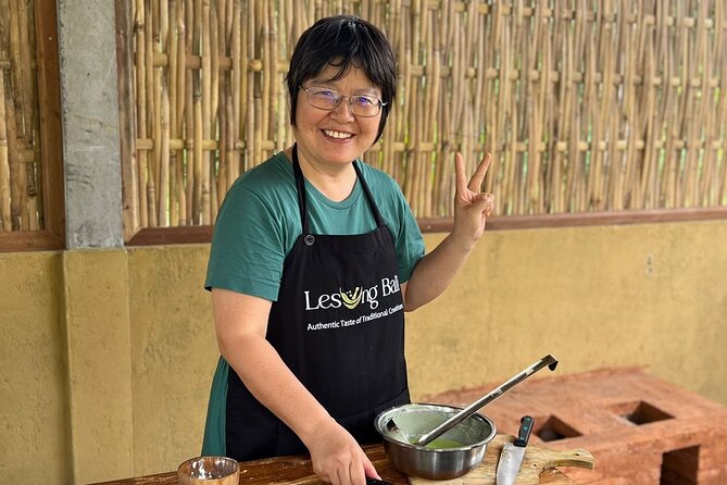 Authentic Balinese Cooking Class in Ubud - Grinding spices the Balinese way