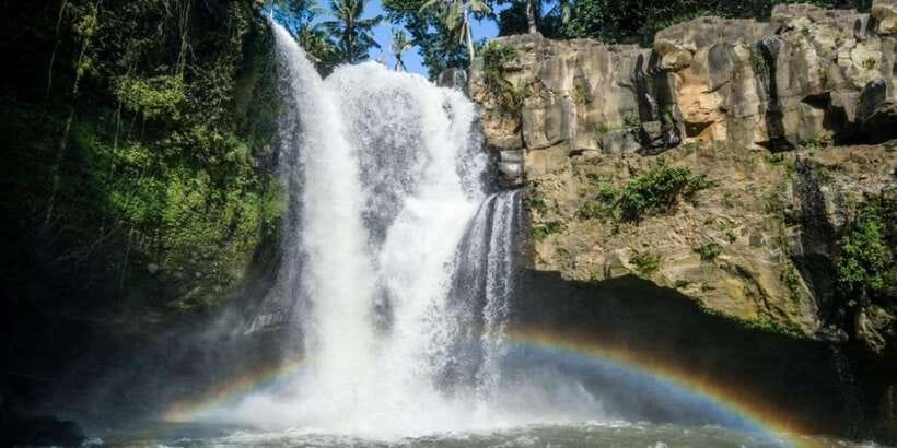 Bali: ATV Gorilla Cave, Ubud Monkey Forest, & Waterfall Tour - Cooling off at Tegenungan Waterfall