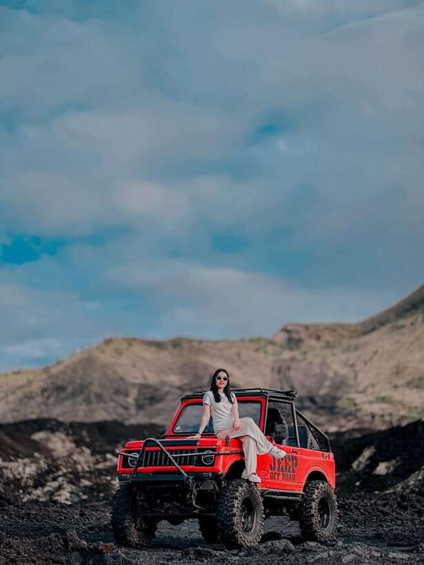 Bali: Hidden Waterfall & Mt. Batur Sunset Jeep Private Tour - Black lava stone and the Kintamani Caldera