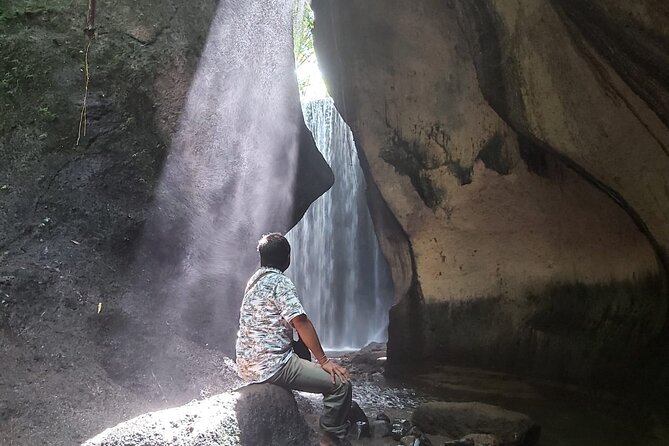 Bali Sightseeing Tour - Traditional village - Waterfall - Goa Raja Waterfall and the walk beneath the cave