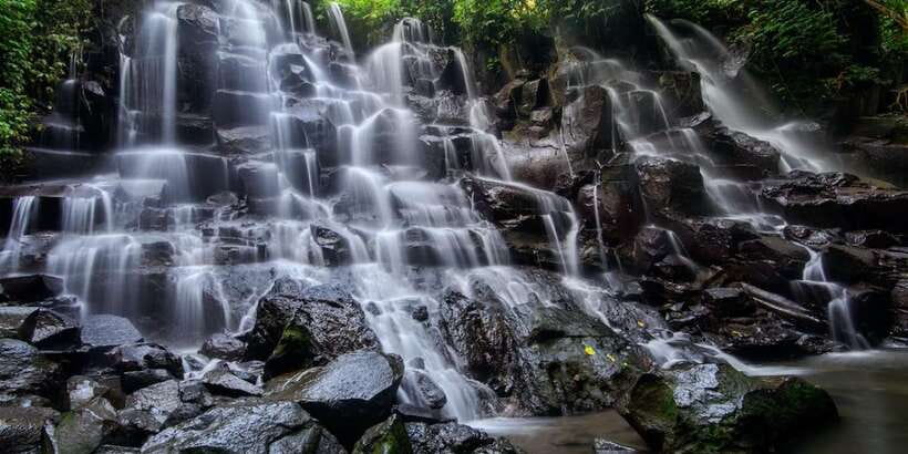 Bali: Waterfall and Rice Terrace Private Day Trip - Tibumana Waterfall and its quieter forest setting