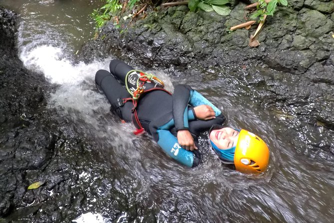 Beginner canyoning trip in Bali "Egar canyon " - Waterfalls, Rappels, and Natural Rock Slides
