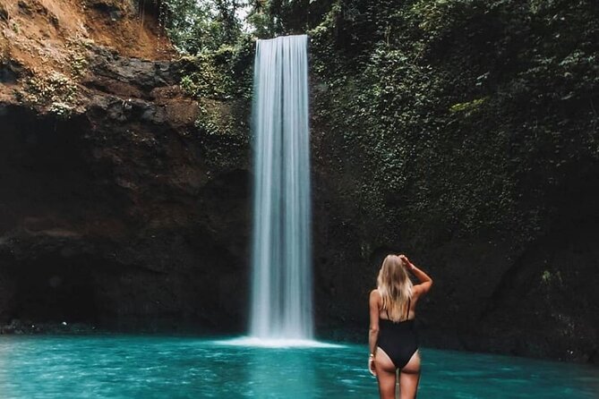 Best of Ubud Waterfalls, Tegalalang Rice Terrace and Swing Tour - Kanto Lampo Waterfall: a short walk to stepped rock
