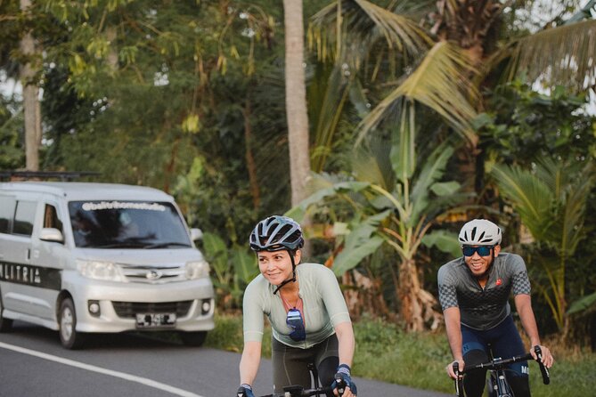 Cycling tour support and evacuation car - The driver and guide support