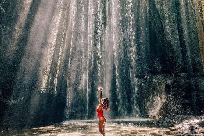 Discover the best waterfalls in Ubud and rice terraces tour - Tukad Cepung Waterfall and its jungle approach