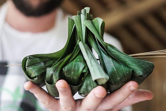 From Ubud: Authentic Bali Farm Cooking School & Organic Farm - Picking vegetables in an organic garden