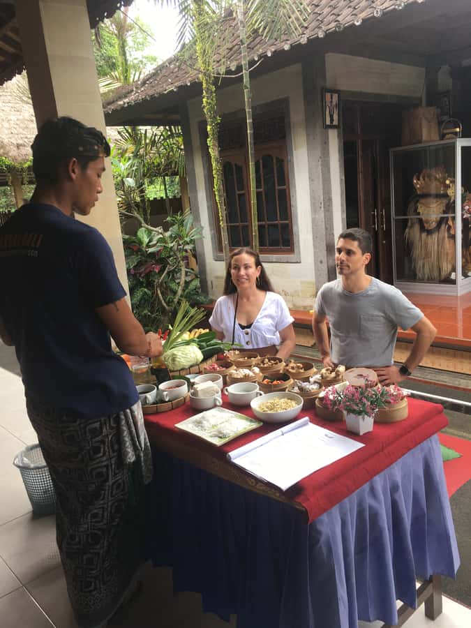 Jambangan bali cooking class with morning market tour - Making offerings and learning about coconut oil