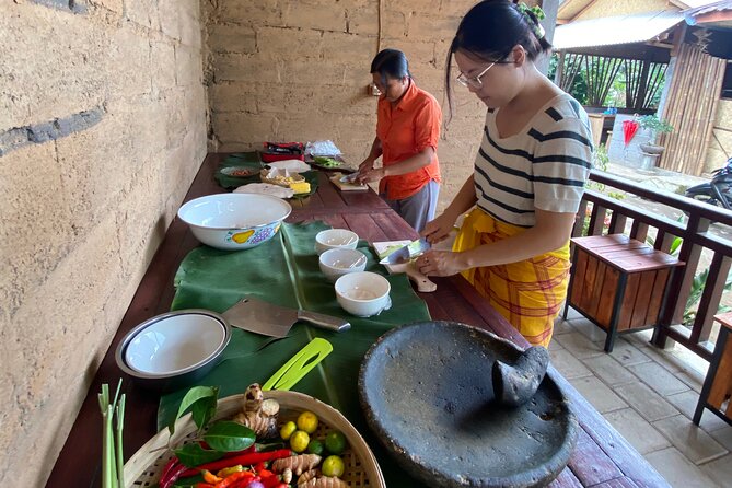 Munduk:authentic local Home cooking class - Picking ingredients in a nearby garden