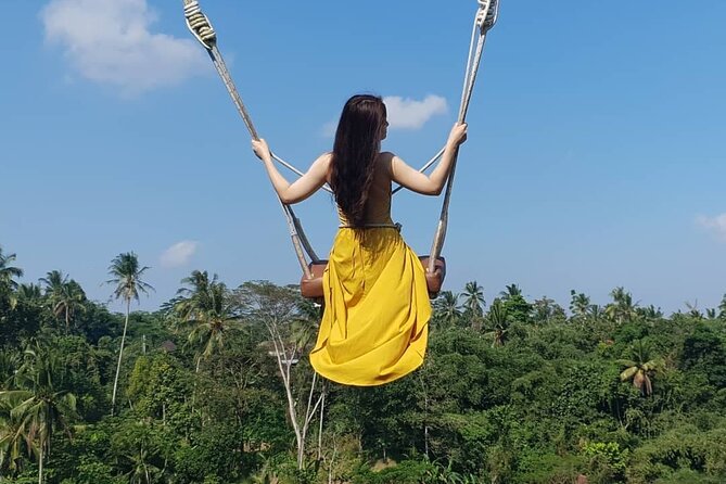 Penglipuran Traditional Village Tour with Swing, Rice Terrace, and Temple - What the day feels like from pickup to return