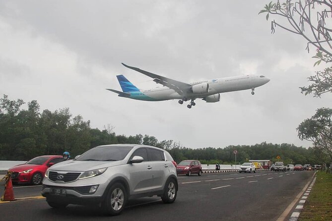 Private Bali Airport Arrival Transfer: Airport to Hotel (Arrival) - Walking Out of Ngurah Rai Airport