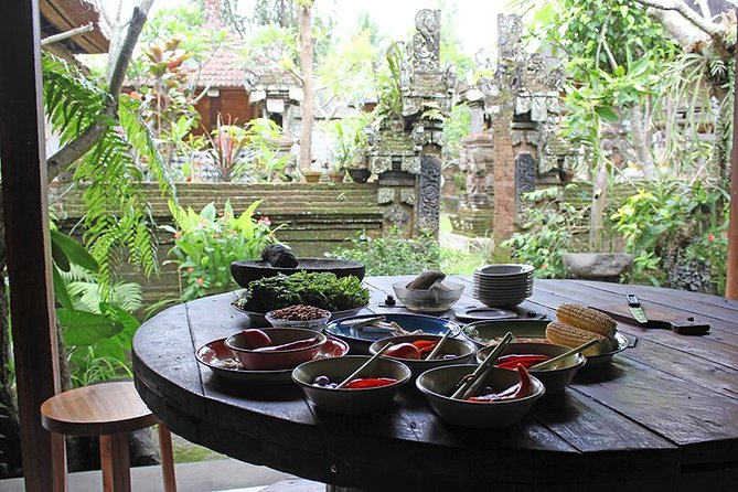 PRIVATE Balinese Cooking Class in Ubud with Dewa with Transfers - Inside the open kitchen with Jero