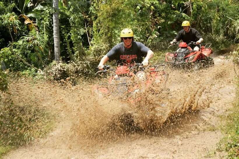 Ubud: Barong Face Cave ATV Quad Bike Ride With Lunch - Muddy tracks, rice paddies, and village scenery