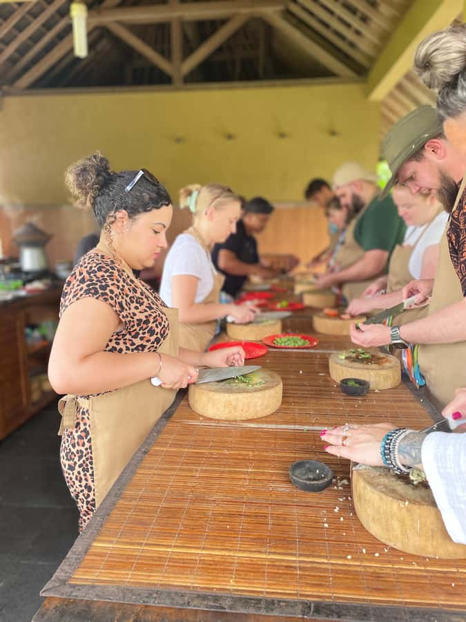 Ubud: Cooking Class with Market Visit and Hotel Pickup - Learning Balinese ingredients at the morning market