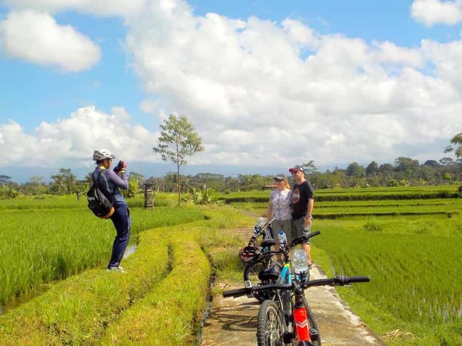 Ubud: Half-Day Tegallalang Electric Cycling Tour - Photos, guides, and the human side of the tour