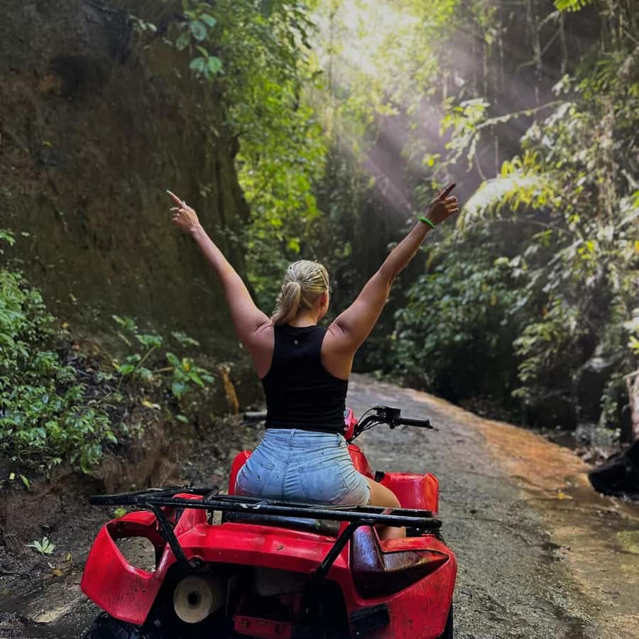 Ubud: Jungle, Waterfall, and Tunnel ATV Tour & Lunch Options - Riding beneath the waterfall