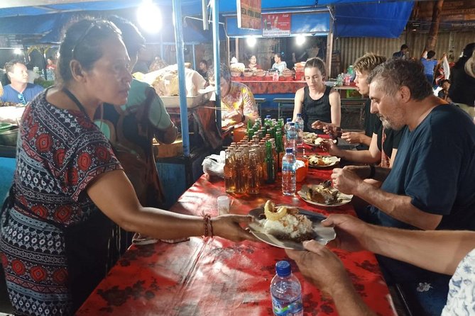 Ubud Night Traditional Market Food Tour - Walking through the famous market