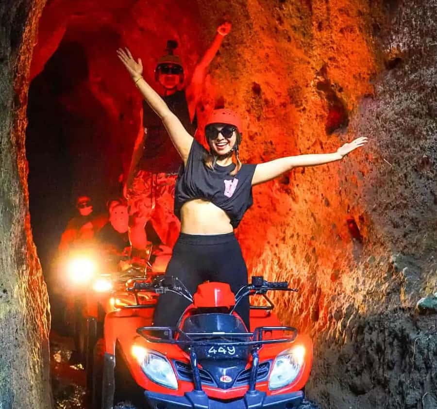 Ubud Quad Bike Tour with Waterfall, Long Tunnel, and Lunch - Through rice fields, villages, and orange groves