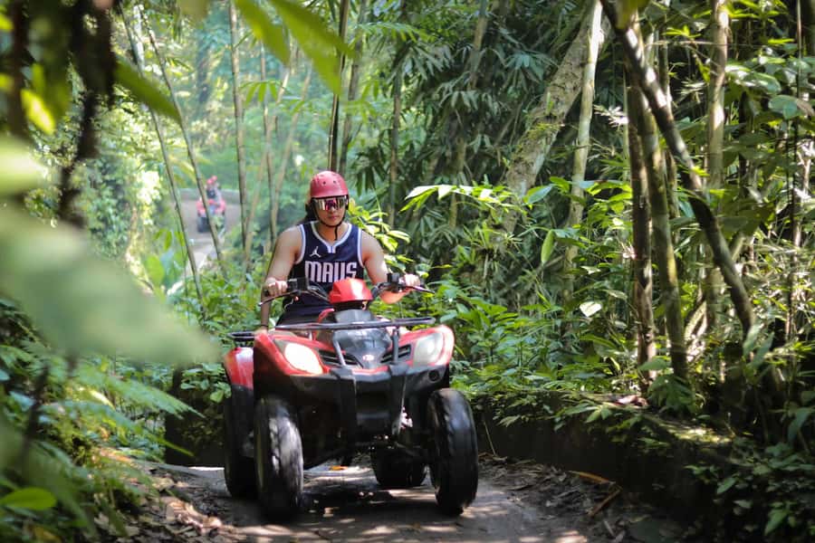 Ubud Quad Bike Tour with Waterfall, Long Tunnel, and Lunch - A waterfall gives the ride a quieter pause