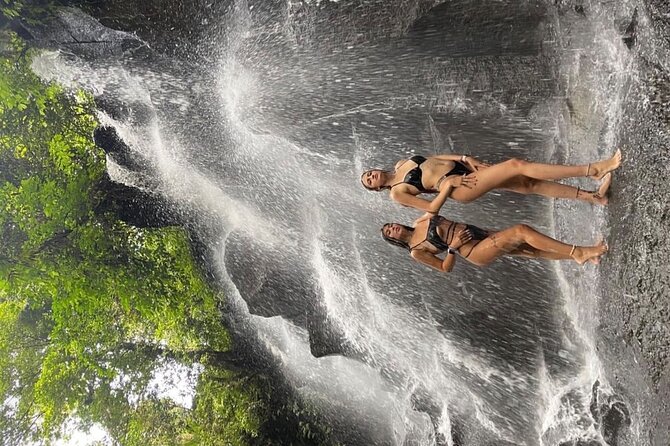 Ubud Surounding Tour - Cooling off at Kanto Lampo Waterfall