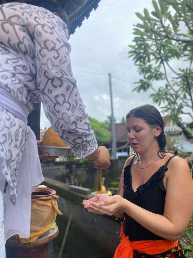 Ubud: Traditional Healing with White Lotus Blessing - Holy water, young coconut, and white lotus flowers