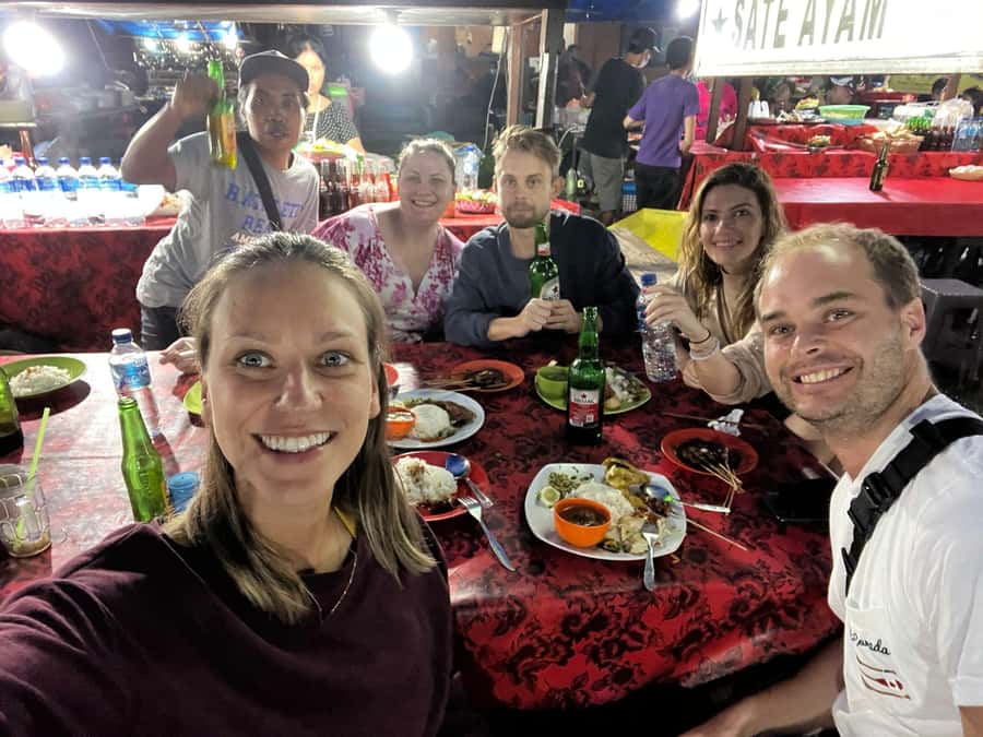 Ubud Traditional Night Market Food Tour-All Inclusive - Walking through the stalls with a local guide