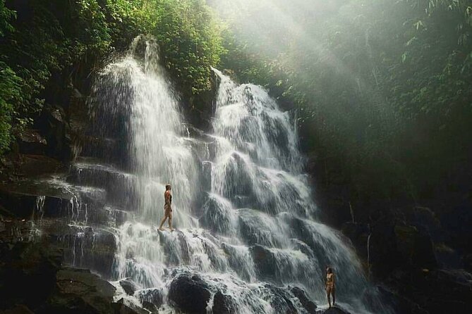 Ubud Waterfalls, Temple and Rice Terrace - Private Tour - Kanto Lampo Waterfall: rock shelves and clear water