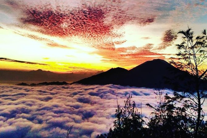 Watch the sunrise from the top of Mount Batur volcano - The climb from paved road to loose rock